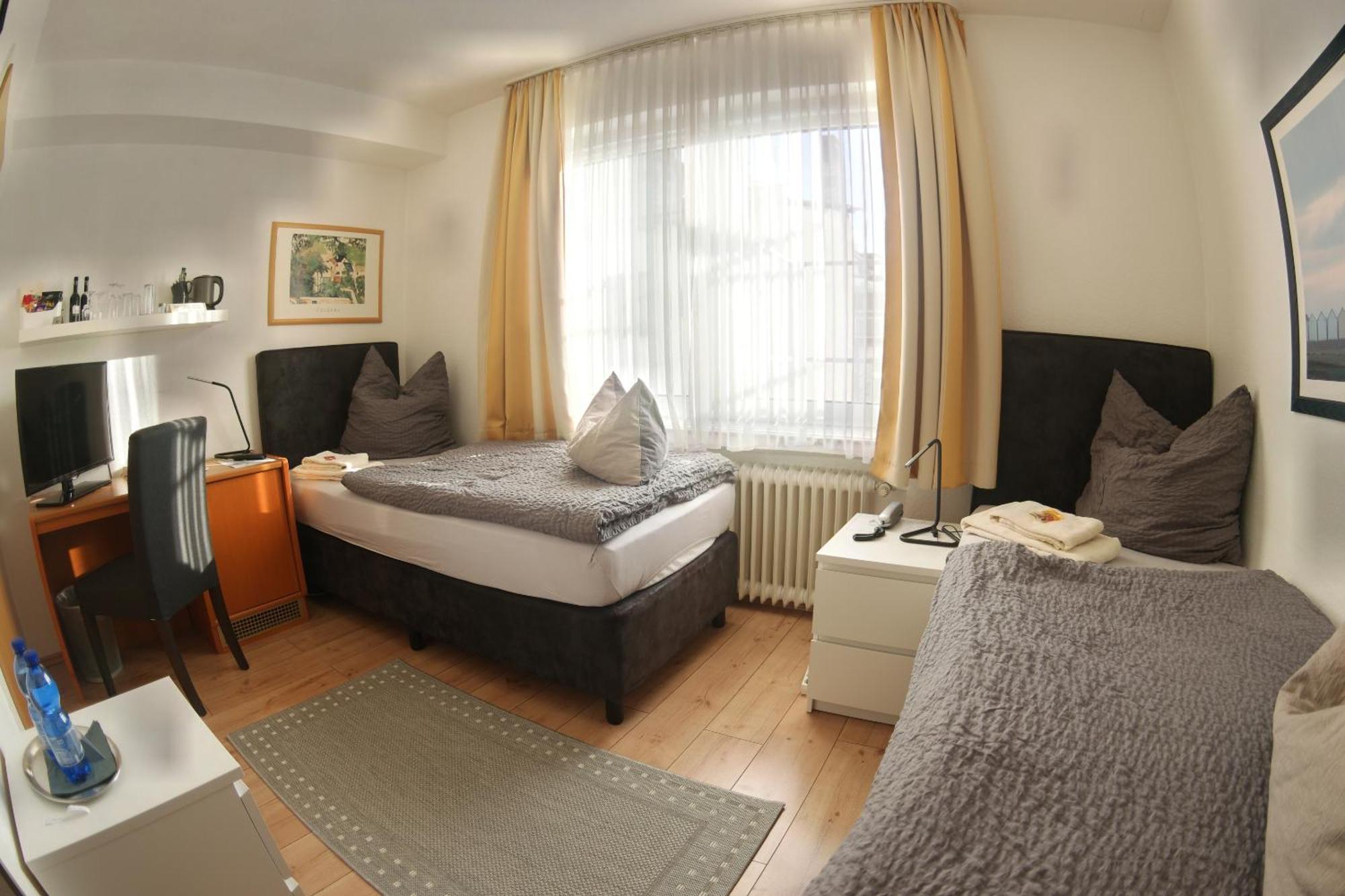 Hotel Merlin Garni Colónia Quarto foto