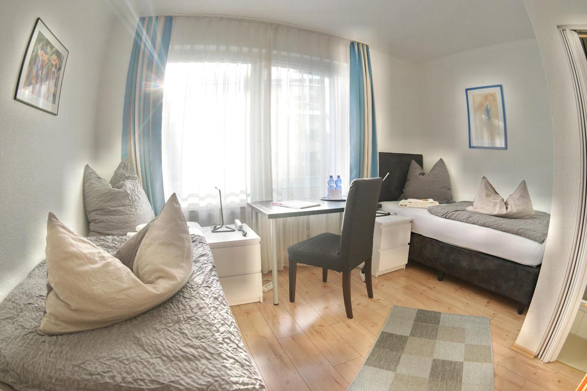 Hotel Merlin Garni Colónia Quarto foto